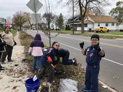 Community members planting street trees