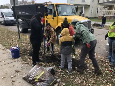 Community members planting street trees