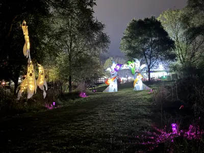 Halloween decorations lit up at night at Haunted Walk event