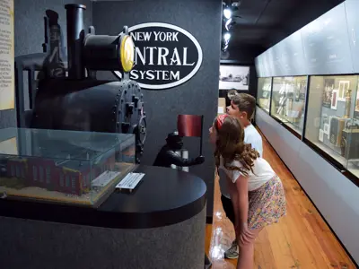 Two children look at the History Hallway exhibit at the NNYCRRM