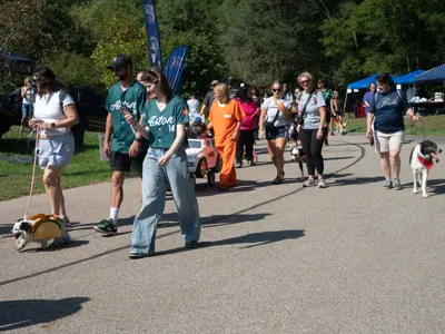 Pooch parade at Waggin' in the Woods event