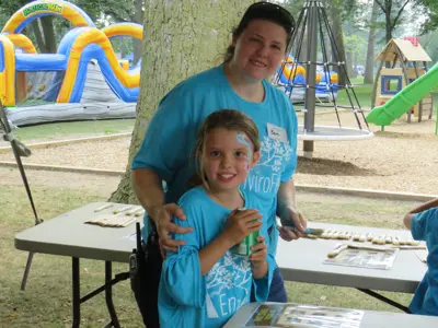 Volunteers helping at Kids Area at EnviroFest event