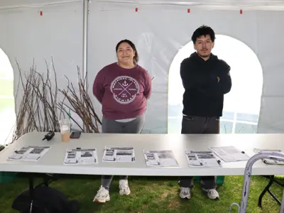 Volunteers helping with tree giveaway at Earth Day event at EEC