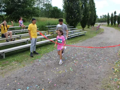 Finish line for scavenger hunt at Pollinator Promenade event