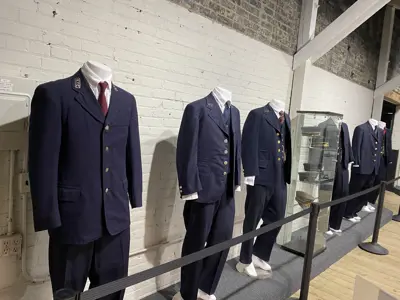 The collection of New York Central railroad uniforms on display at the National New York Central Railroad Museum
